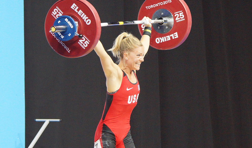 US Olympian Morghan completes a ‘clean and jerk’ lift.